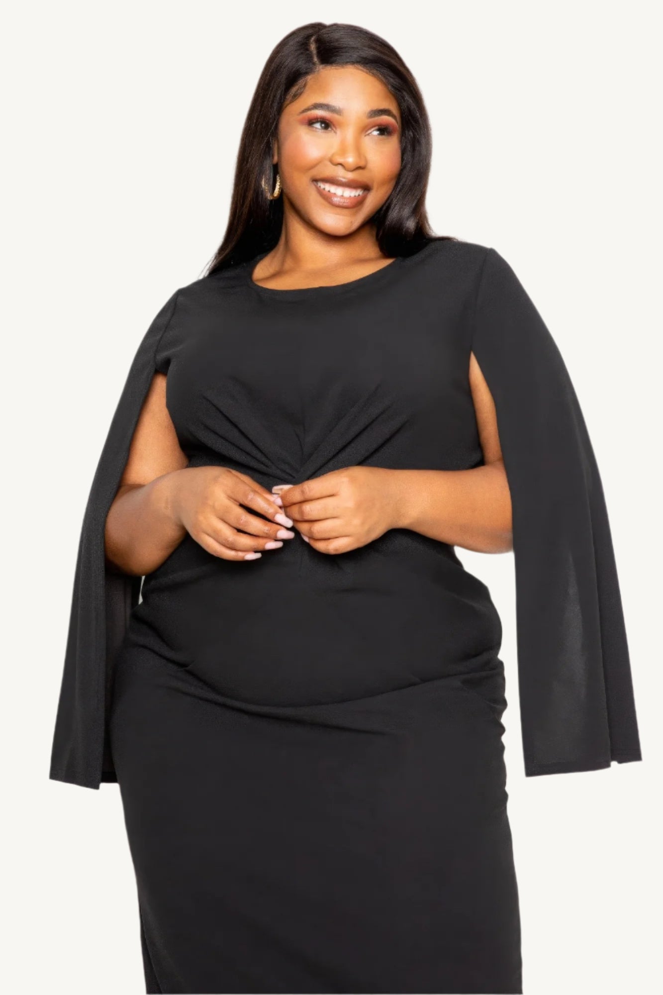 "Timeless black cape sleeve dress with front knot detail, tailored for elegance and comfort — perfect for formal or special occasions."