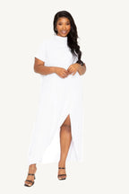 "Mock neck dress with dramatic back cape, combining sleek modern style with timeless sophistication — perfect for formal or special occasions."