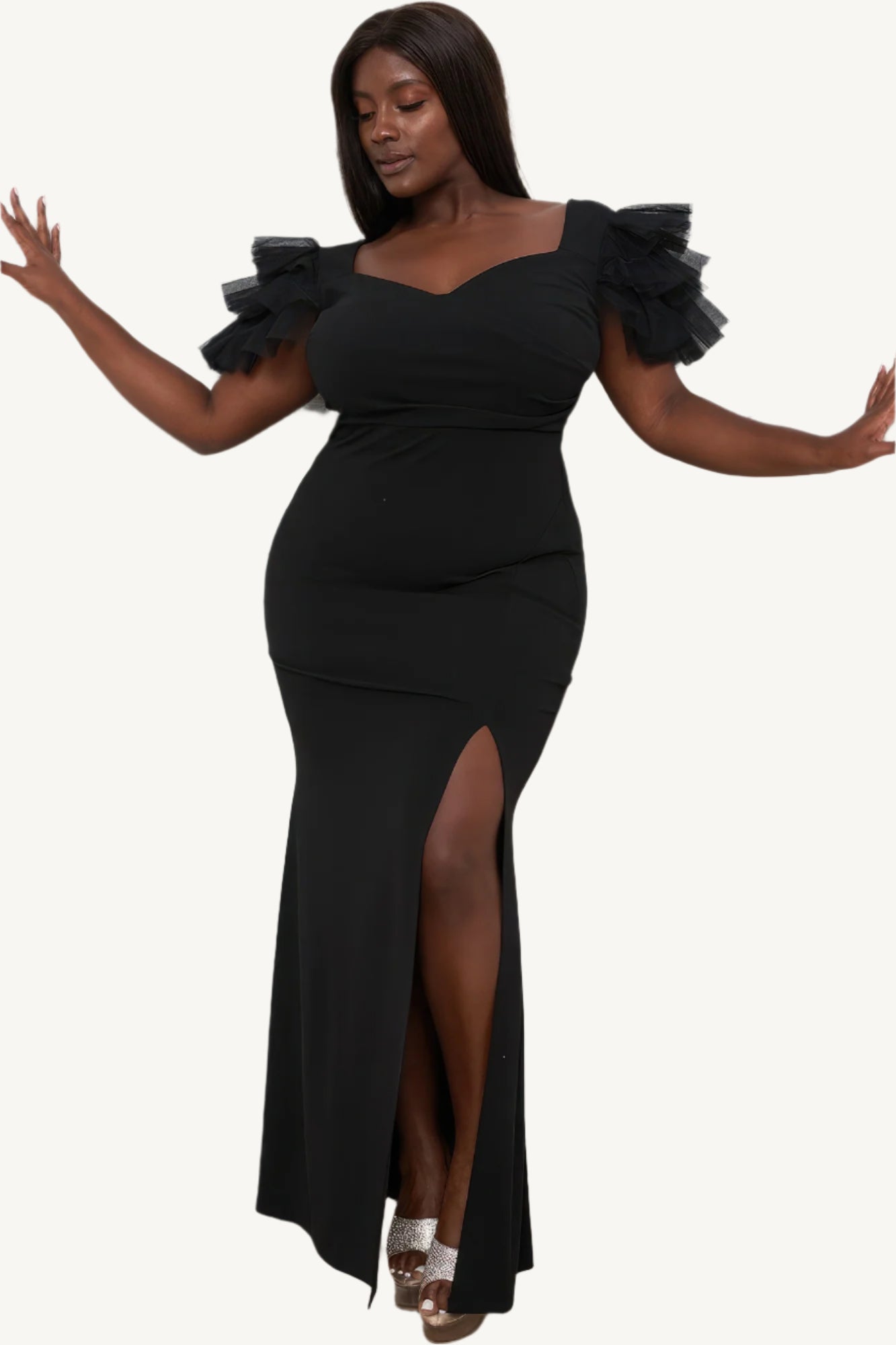 "Plus size maxi dress with mesh tulle shoulders, surplice neckline, pleated details, side slit, and zipper back — designed to enhance curves with elegance."