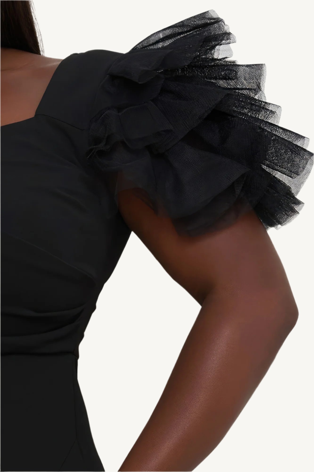 "Plus size maxi dress with mesh tulle shoulders, surplice neckline, pleated details, side slit, and zipper back — designed to enhance curves with elegance."