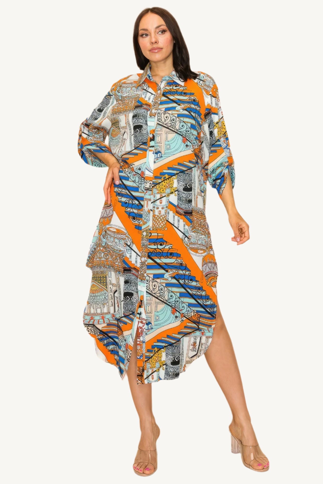 "Printed shirt dress with button-down front, adjustable sleeves, and side pockets — designed for style, comfort, and versatility."