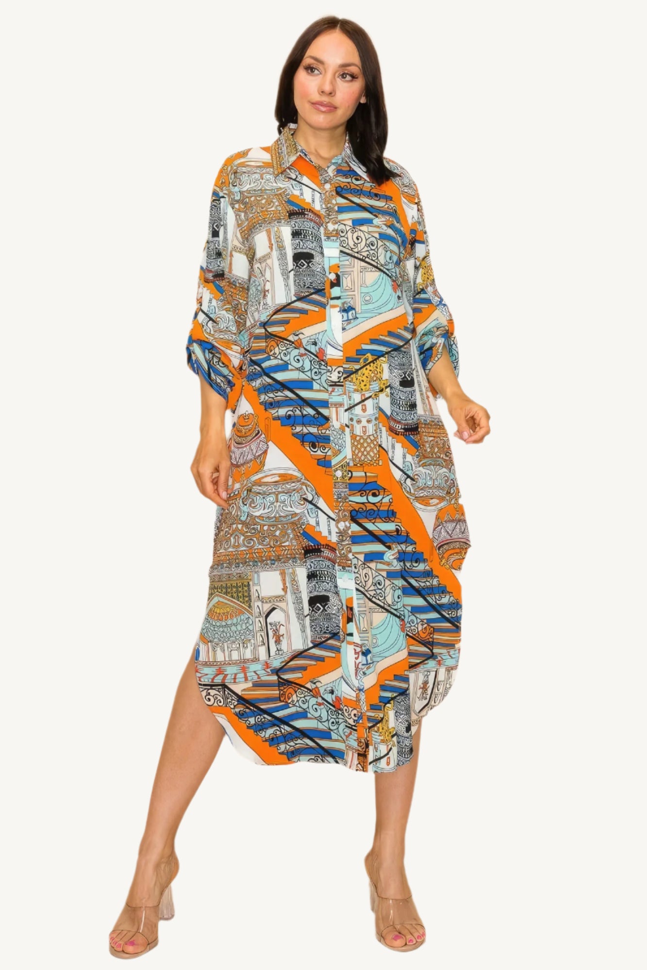 "Printed shirt dress with button-down front, adjustable sleeves, and side pockets — designed for style, comfort, and versatility."