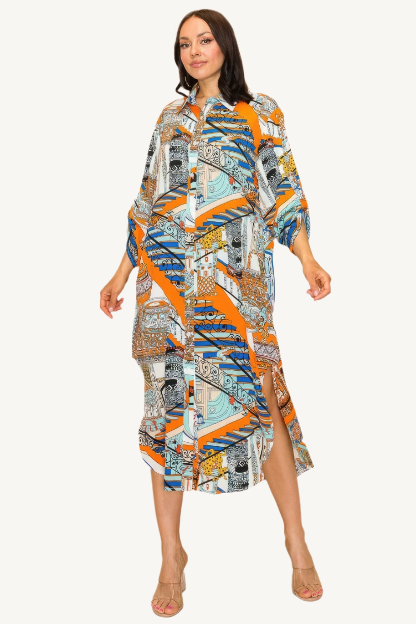 "Printed shirt dress with button-down front, adjustable sleeves, and side pockets — designed for style, comfort, and versatility."