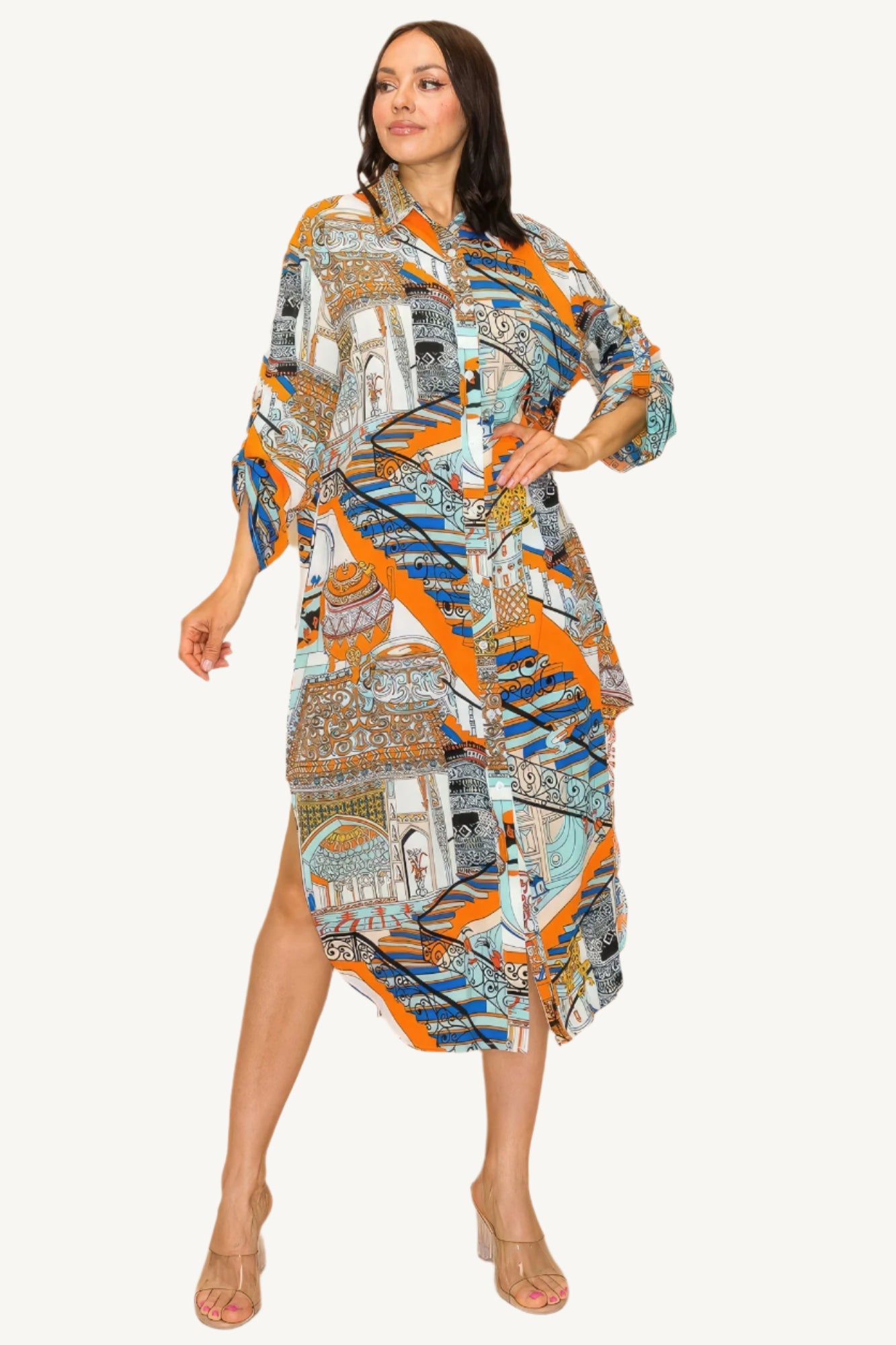 "Printed shirt dress with button-down front, adjustable sleeves, and side pockets — designed for style, comfort, and versatility."