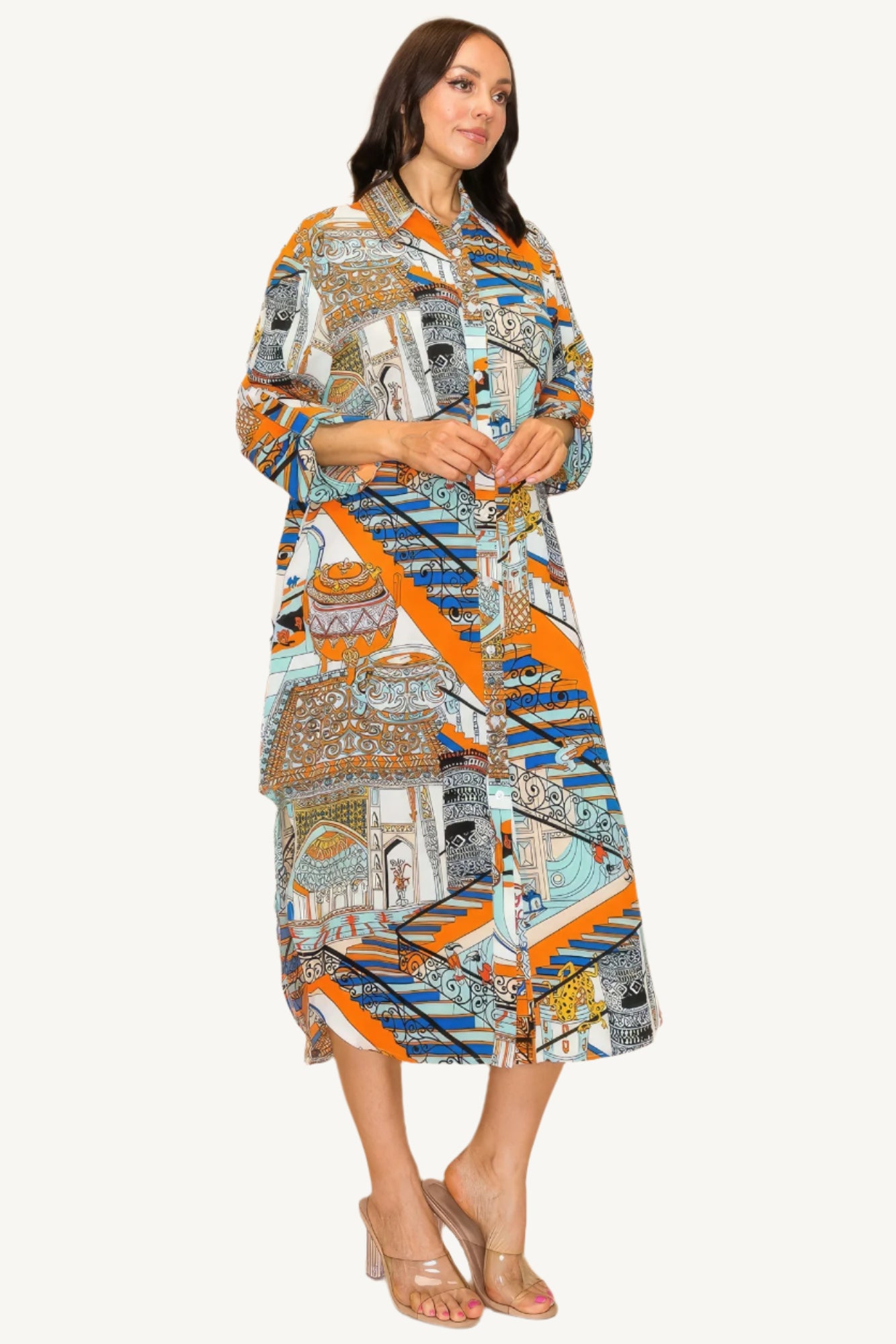 "Printed shirt dress with button-down front, adjustable sleeves, and side pockets — designed for style, comfort, and versatility."