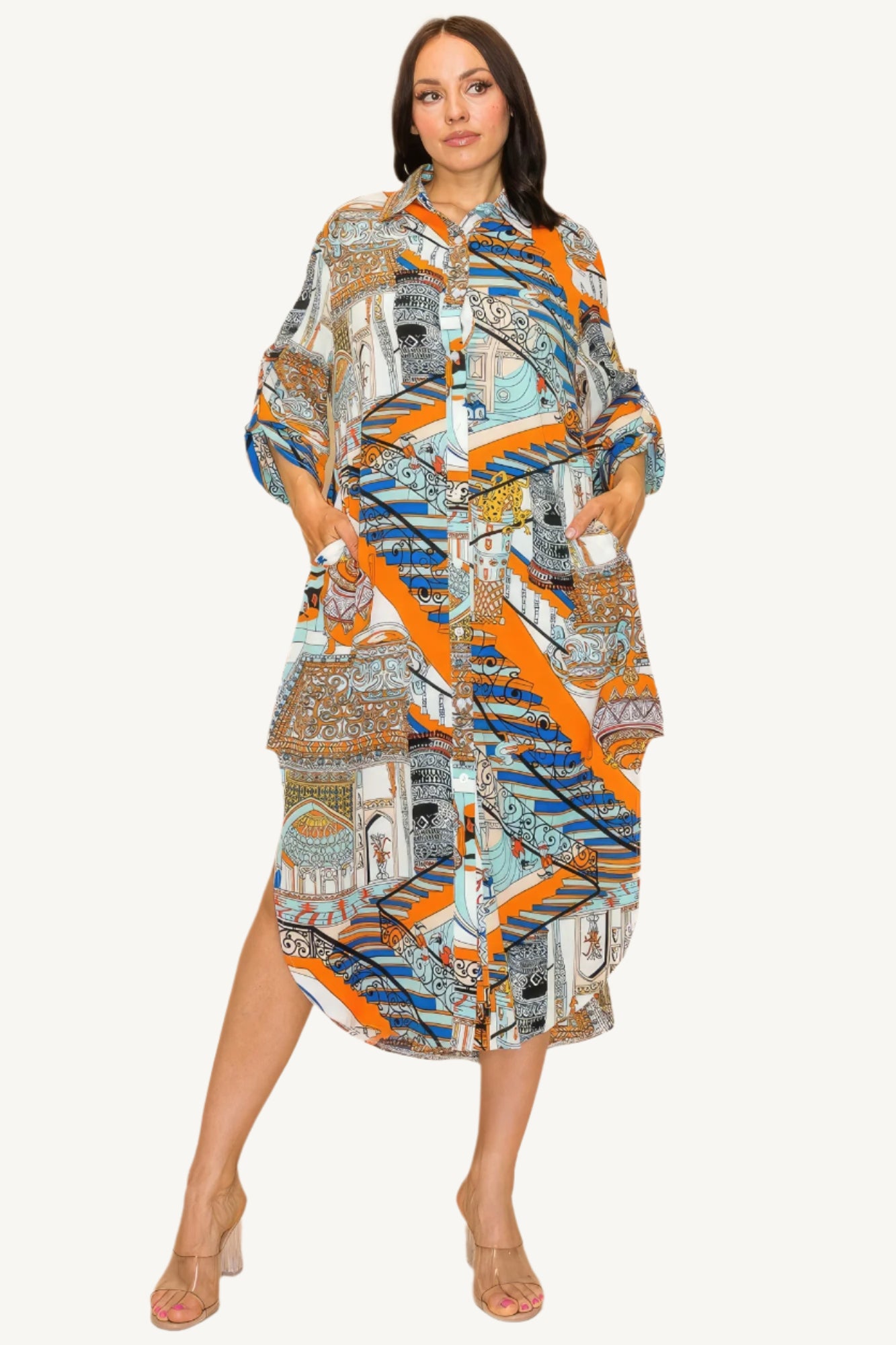 "Printed shirt dress with button-down front, adjustable sleeves, and side pockets — designed for style, comfort, and versatility."