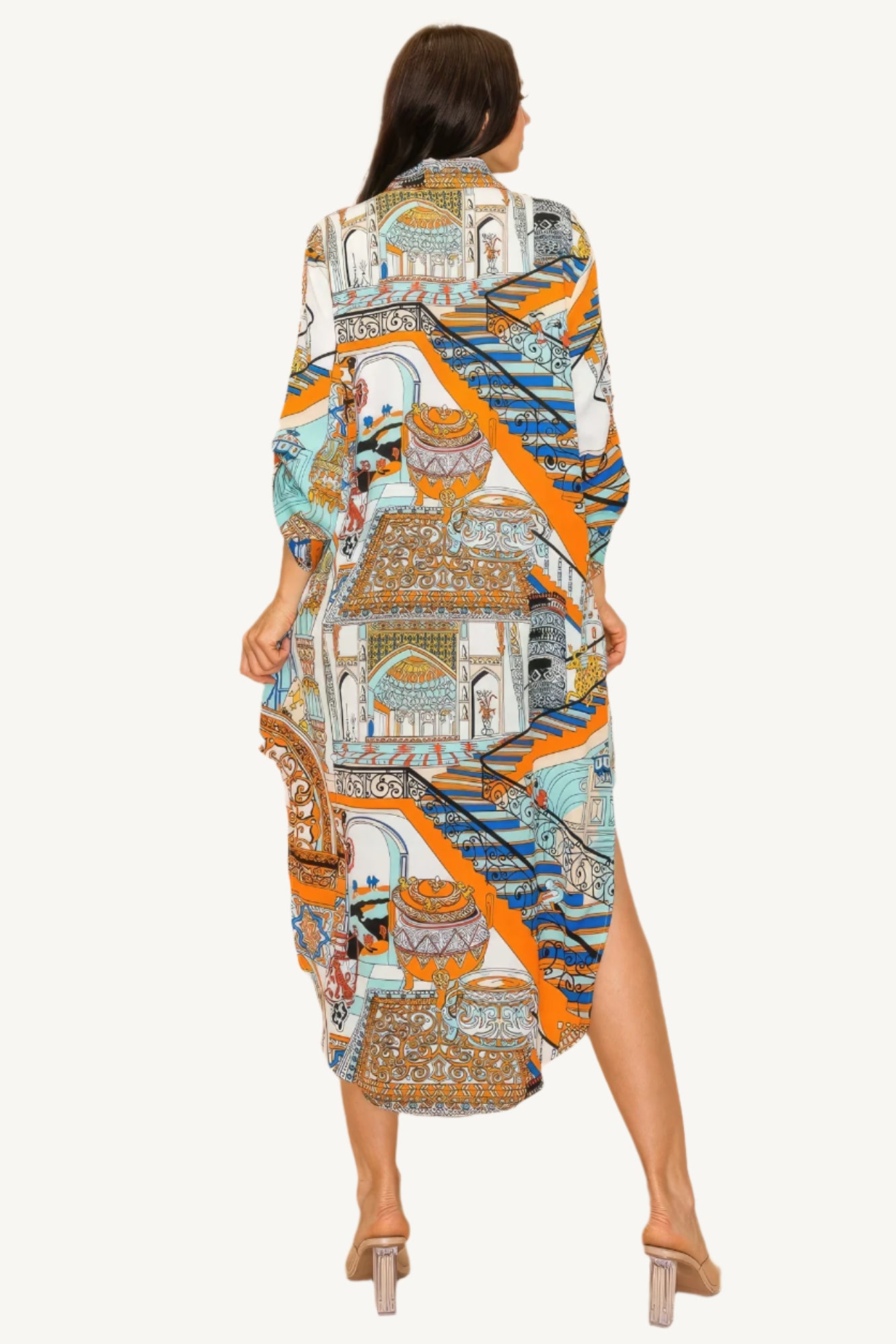 "Printed shirt dress with button-down front, adjustable sleeves, and side pockets — designed for style, comfort, and versatility."
