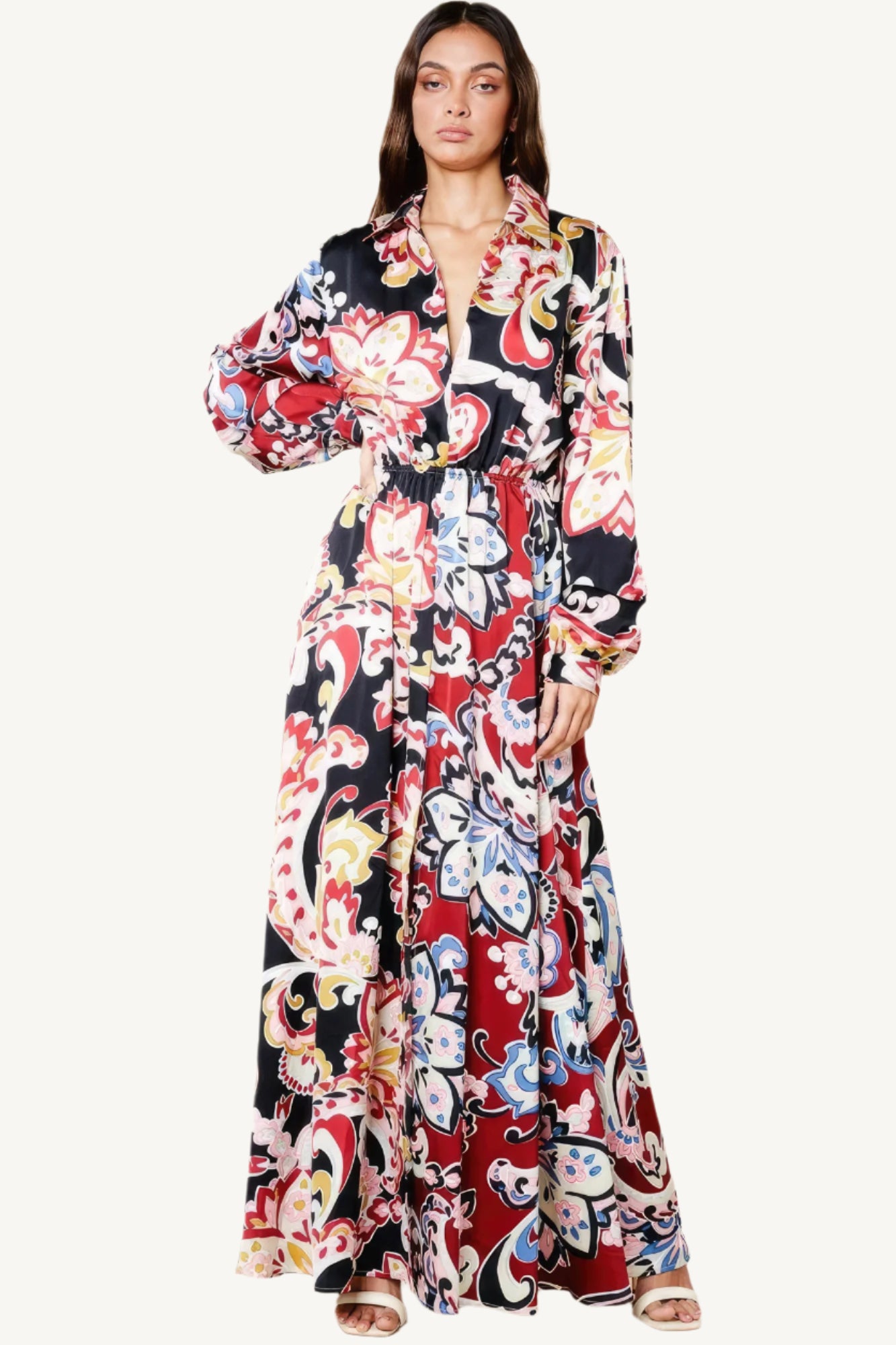 "Color block printed V-neck dress with front slit, pockets, and elastic waist, made from silk-like polyester for a chic and comfortable fit."