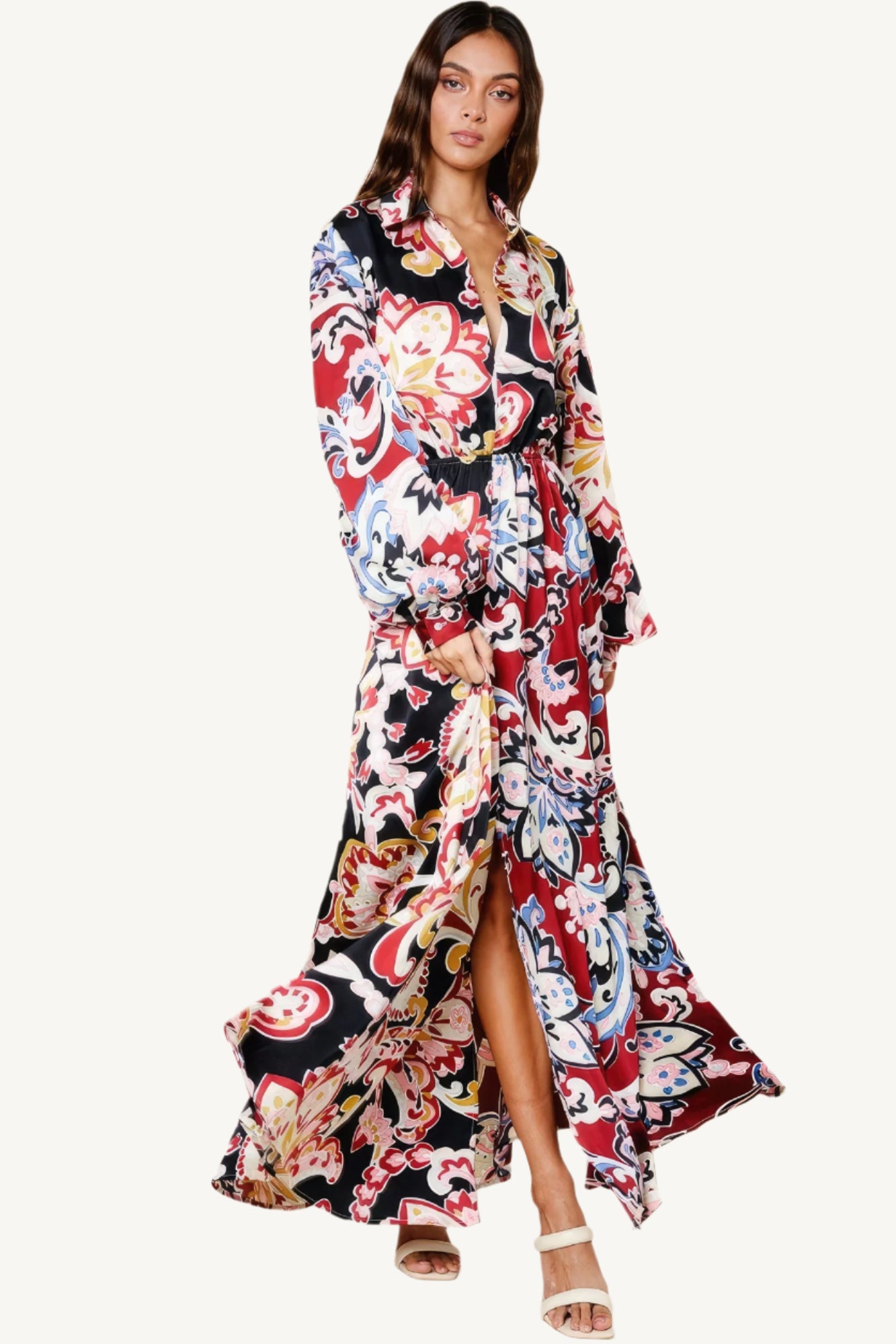 "Color block printed V-neck dress with front slit, pockets, and elastic waist, made from silk-like polyester for a chic and comfortable fit."