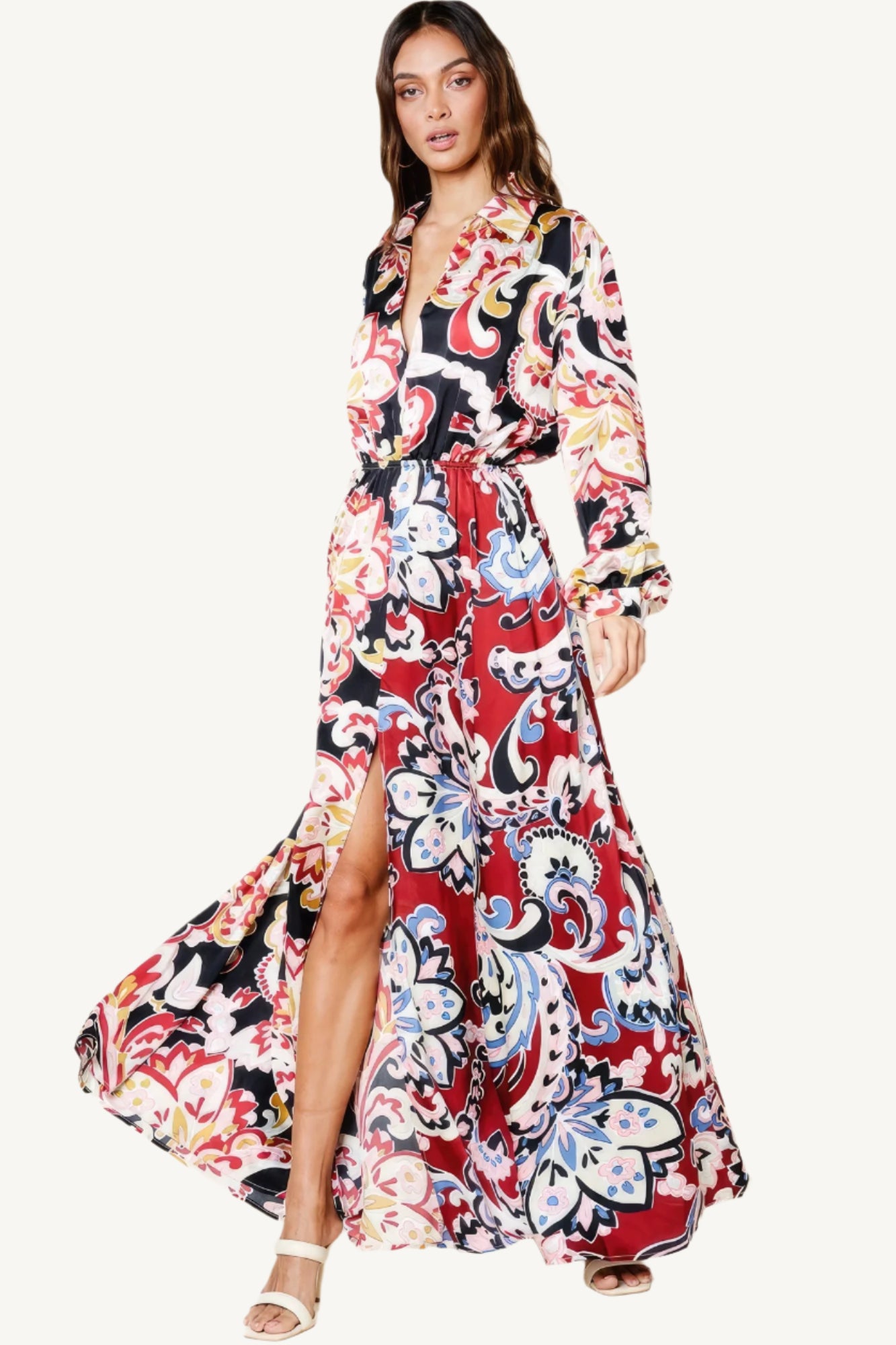 "Color block printed V-neck dress with front slit, pockets, and elastic waist, made from silk-like polyester for a chic and comfortable fit."