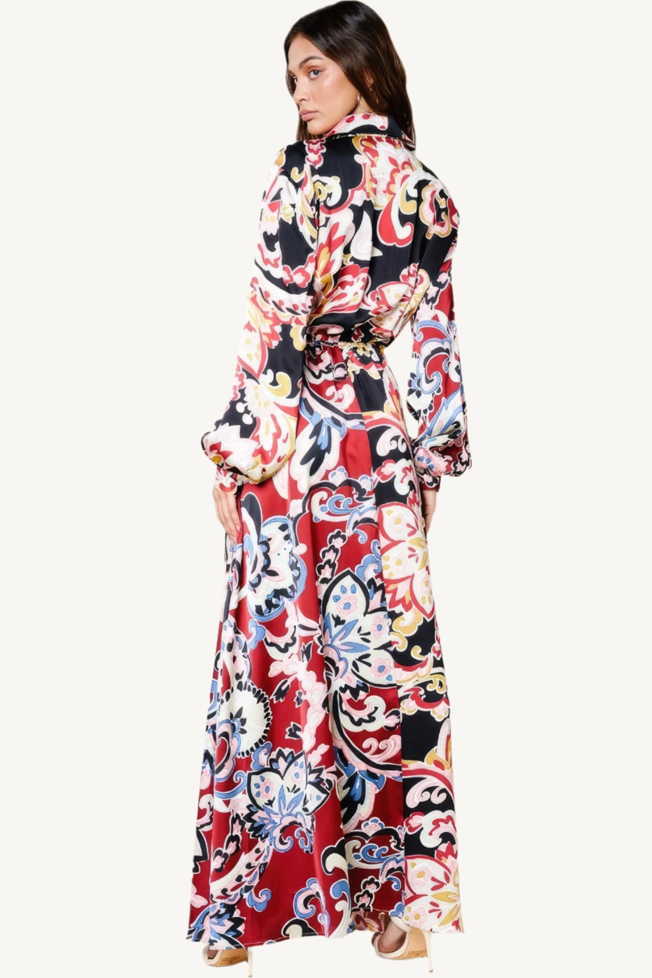 "Color block printed V-neck dress with front slit, pockets, and elastic waist, made from silk-like polyester for a chic and comfortable fit."