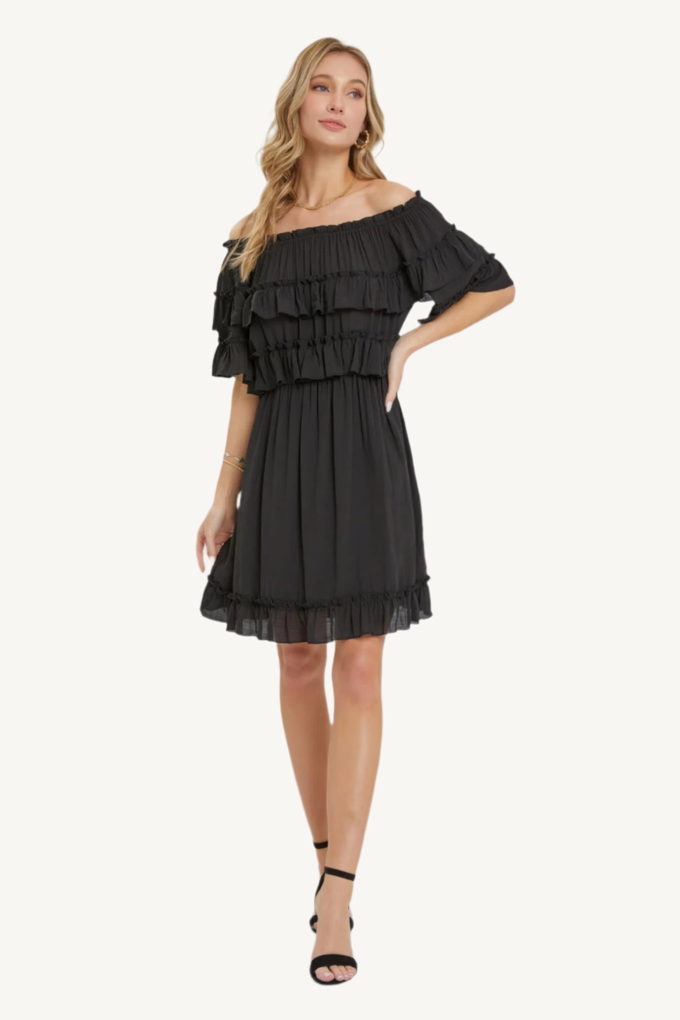 "Bohemian-style off-shoulder dress with short sleeves, elastic waist, and ruffle hem — relaxed fit for a free-spirited, feminine look."