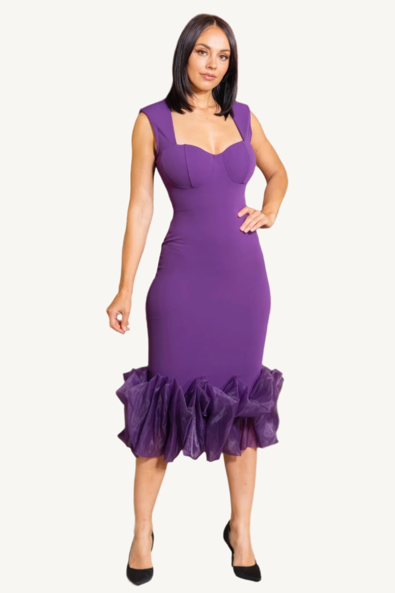 "Elegant midi dress with organza ruffle detailing, sleeveless design, and back zipper closure for a chic and graceful silhouette."