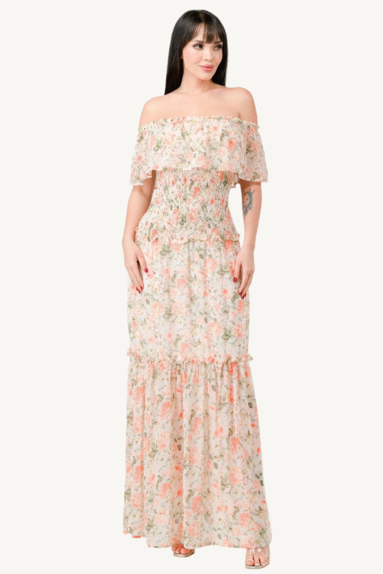 "Floral chiffon off-shoulder maxi dress with smocked back and ruffled tiered design, made from lightweight polyester for an elegant and comfortable look."
