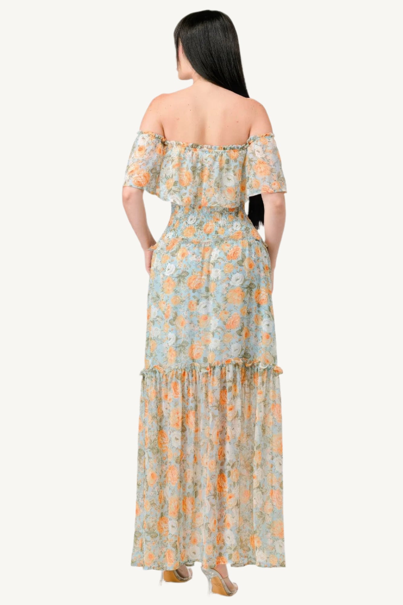 "Floral chiffon off-shoulder tiered maxi dress with smocked back and ruffle details, made from lightweight 100% polyester for an elegant, flowy look."