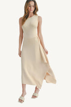 Maxi dress with side slit, made from 100% viscose. Lightweight, breathable, and elegant — perfect for stylish comfort and fluid movement.