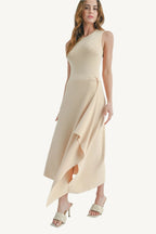 Maxi dress with side slit, made from 100% viscose. Lightweight, breathable, and elegant — perfect for stylish comfort and fluid movement.