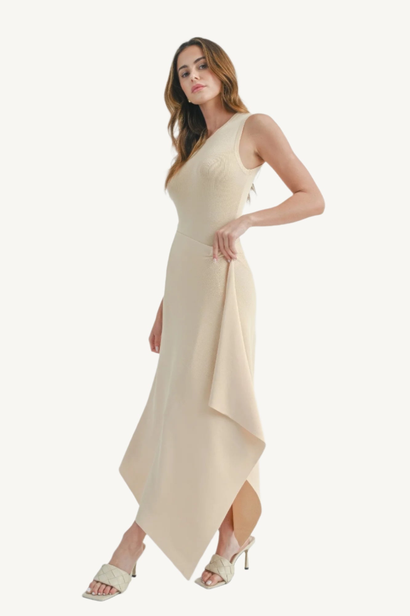 Maxi dress with side slit, made from 100% viscose. Lightweight, breathable, and elegant — perfect for stylish comfort and fluid movement.