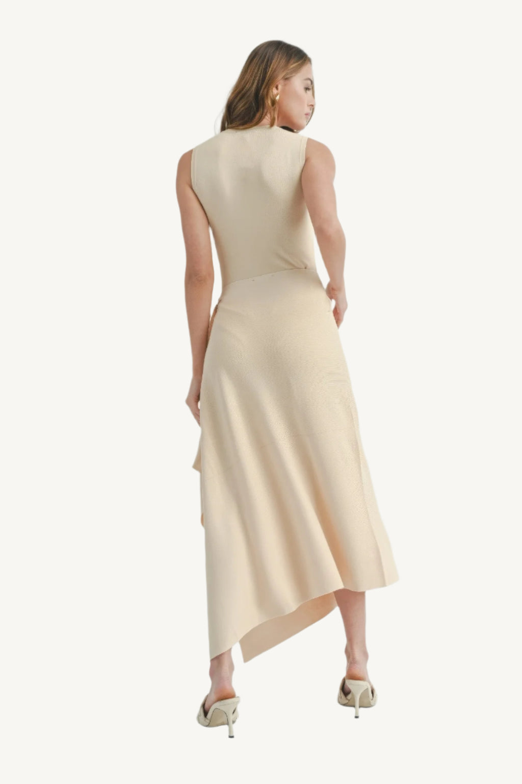 Maxi dress with side slit, made from 100% viscose. Lightweight, breathable, and elegant — perfect for stylish comfort and fluid movement.