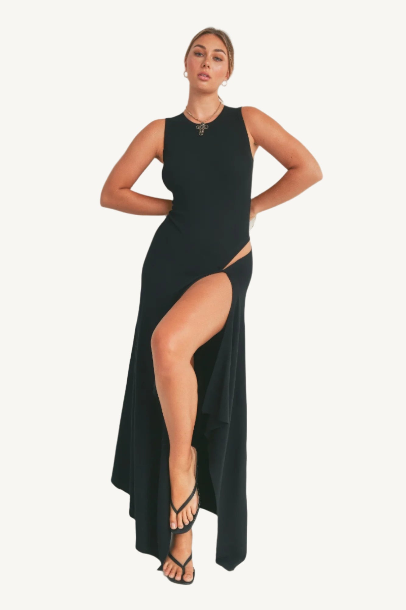 Elegant viscose maxi dress with thigh-high slit. Lightweight, breathable fabric for effortless style and comfort with fluid movement.