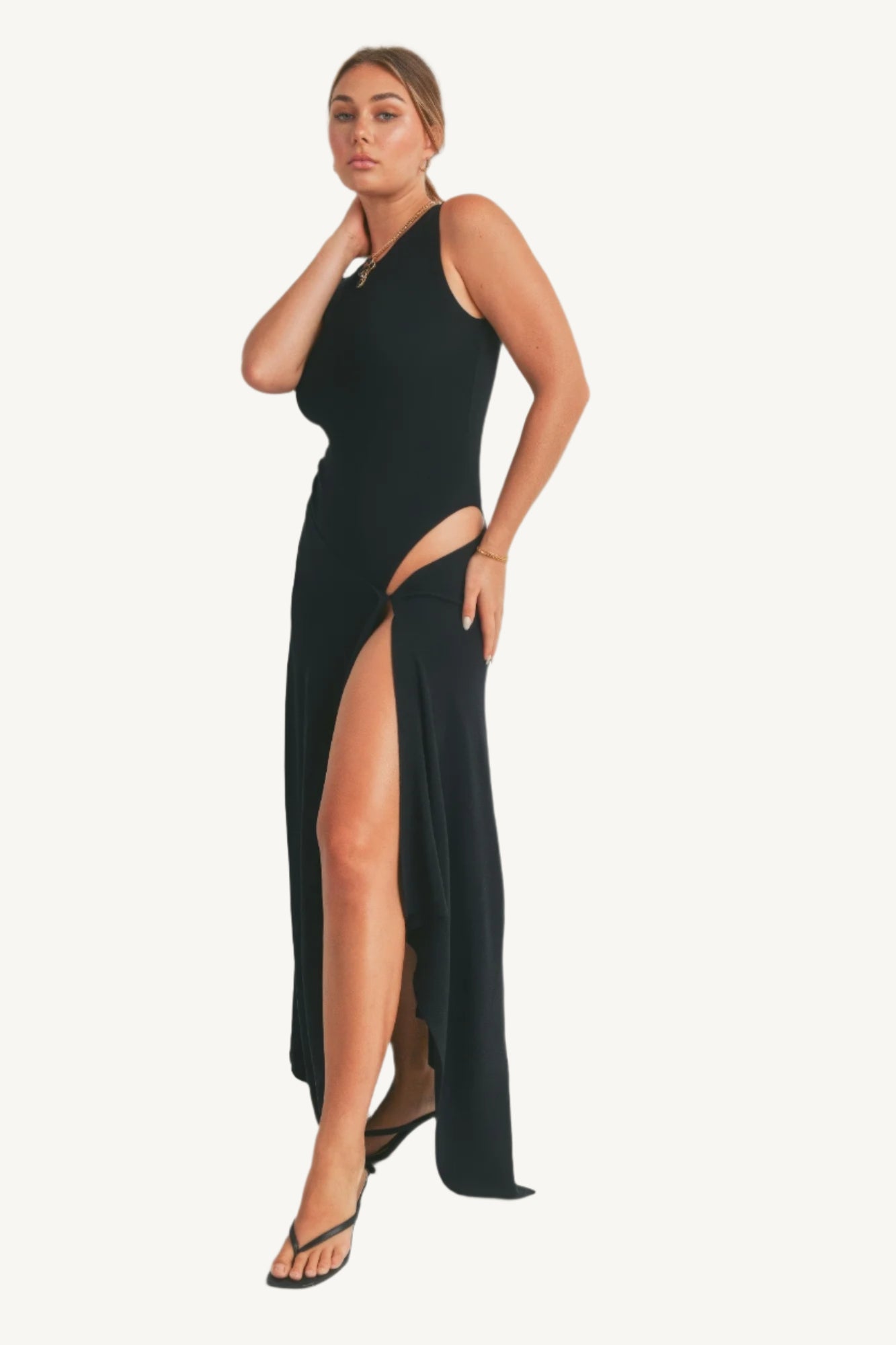 Elegant viscose maxi dress with thigh-high slit. Lightweight, breathable fabric for effortless style and comfort with fluid movement.