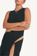 Elegant viscose maxi dress with thigh-high slit. Lightweight, breathable fabric for effortless style and comfort with fluid movement.