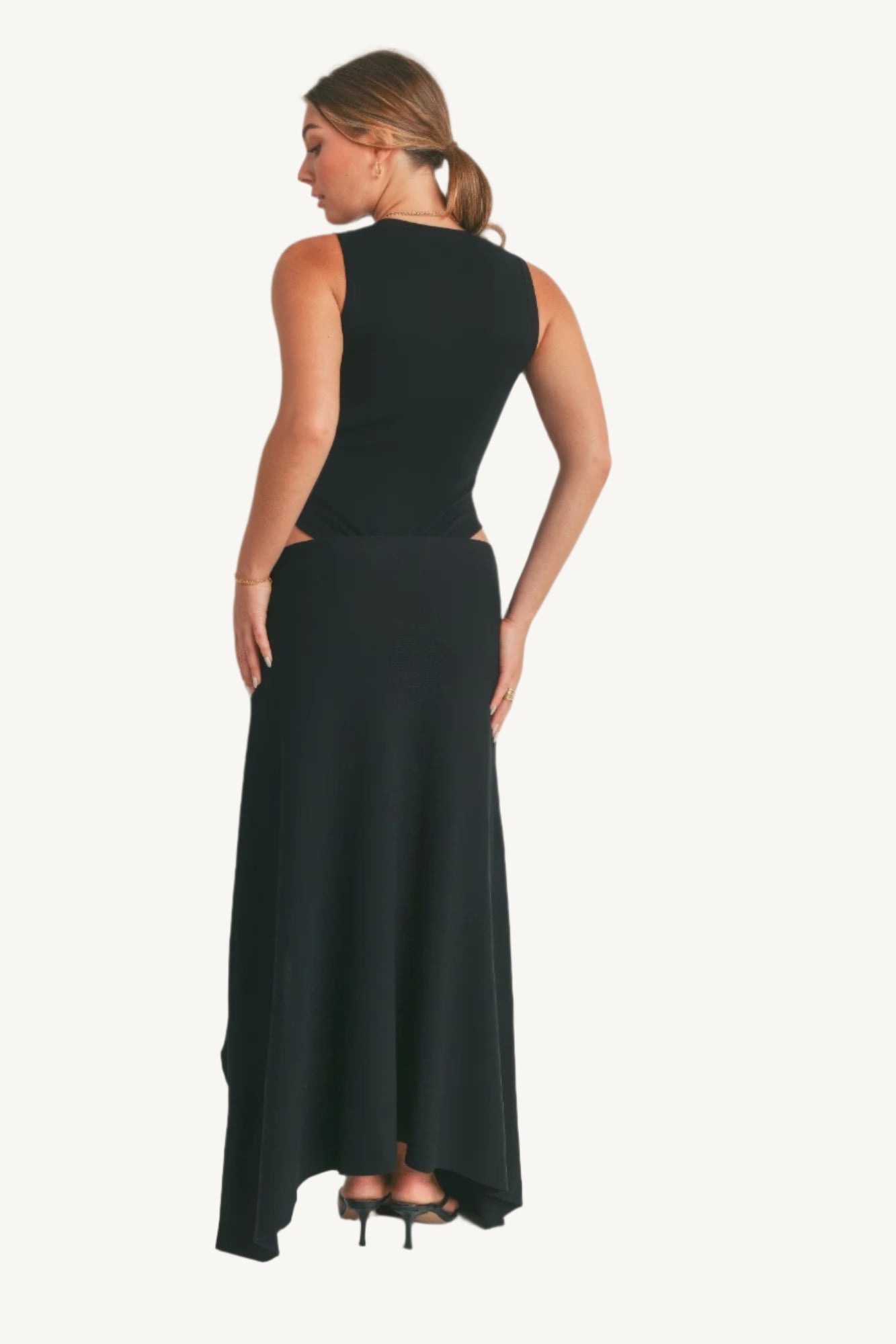 Elegant viscose maxi dress with thigh-high slit. Lightweight, breathable fabric for effortless style and comfort with fluid movement.