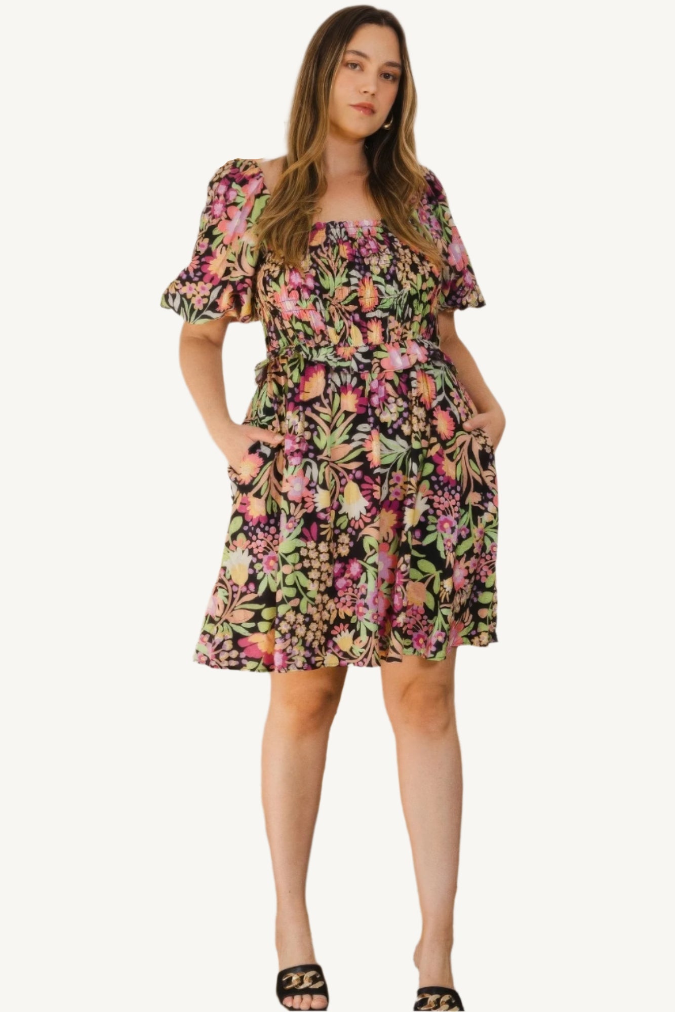 "Plus size floral printed mini dress with center tie-back detail, designed for a flattering, feminine, and comfortable fit."