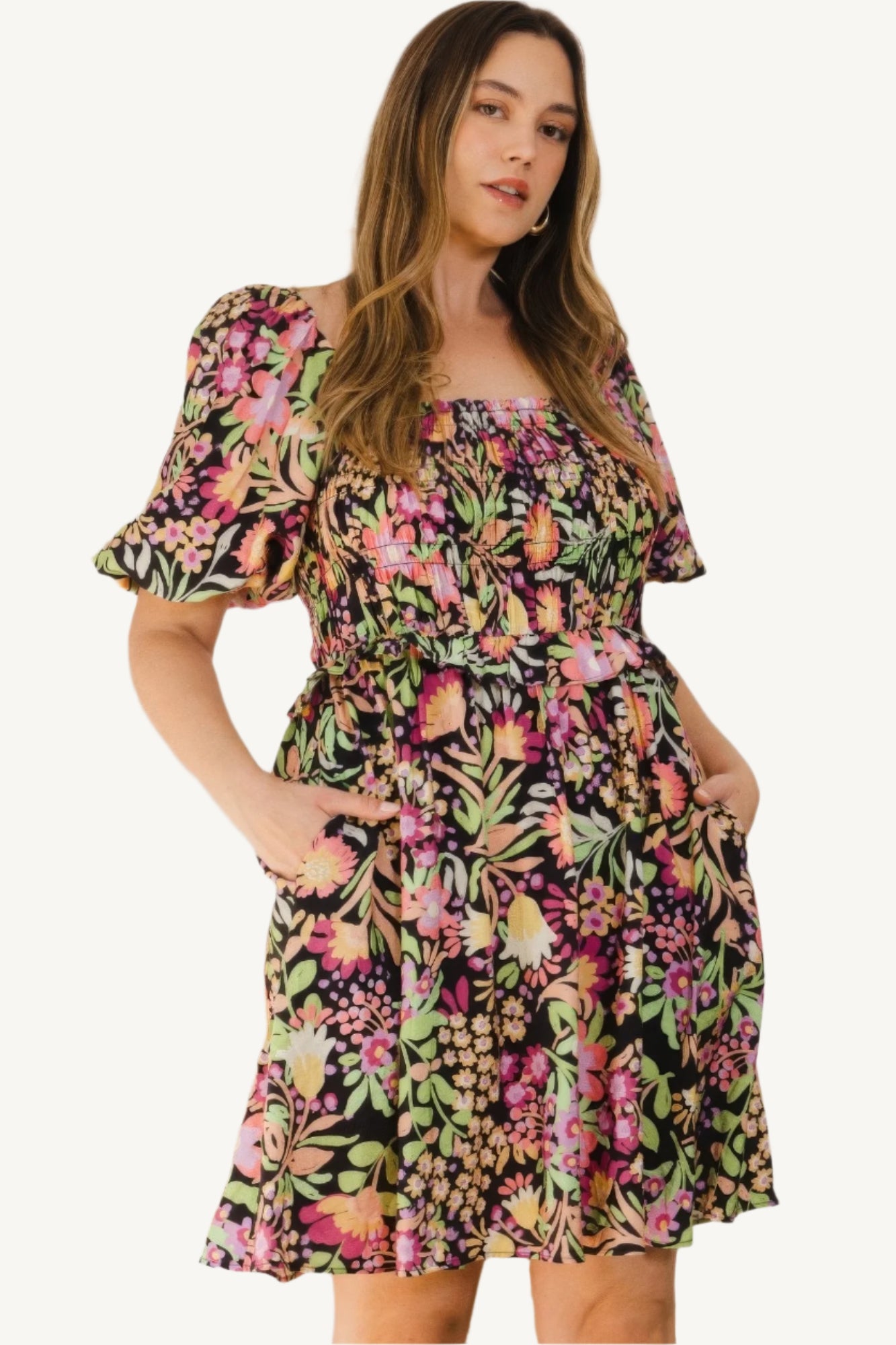 "Plus size floral printed mini dress with center tie-back detail, designed for a flattering, feminine, and comfortable fit."