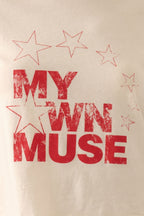 Beige fabric with red text 'MY OWN MUSE' and star designs.