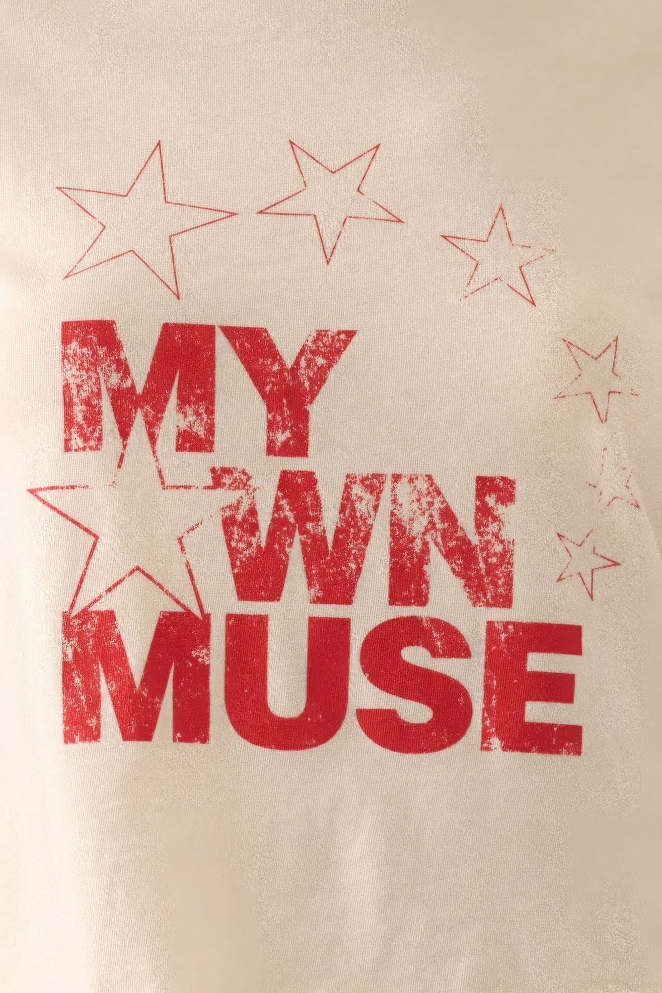 Beige fabric with red text 'MY OWN MUSE' and star designs.