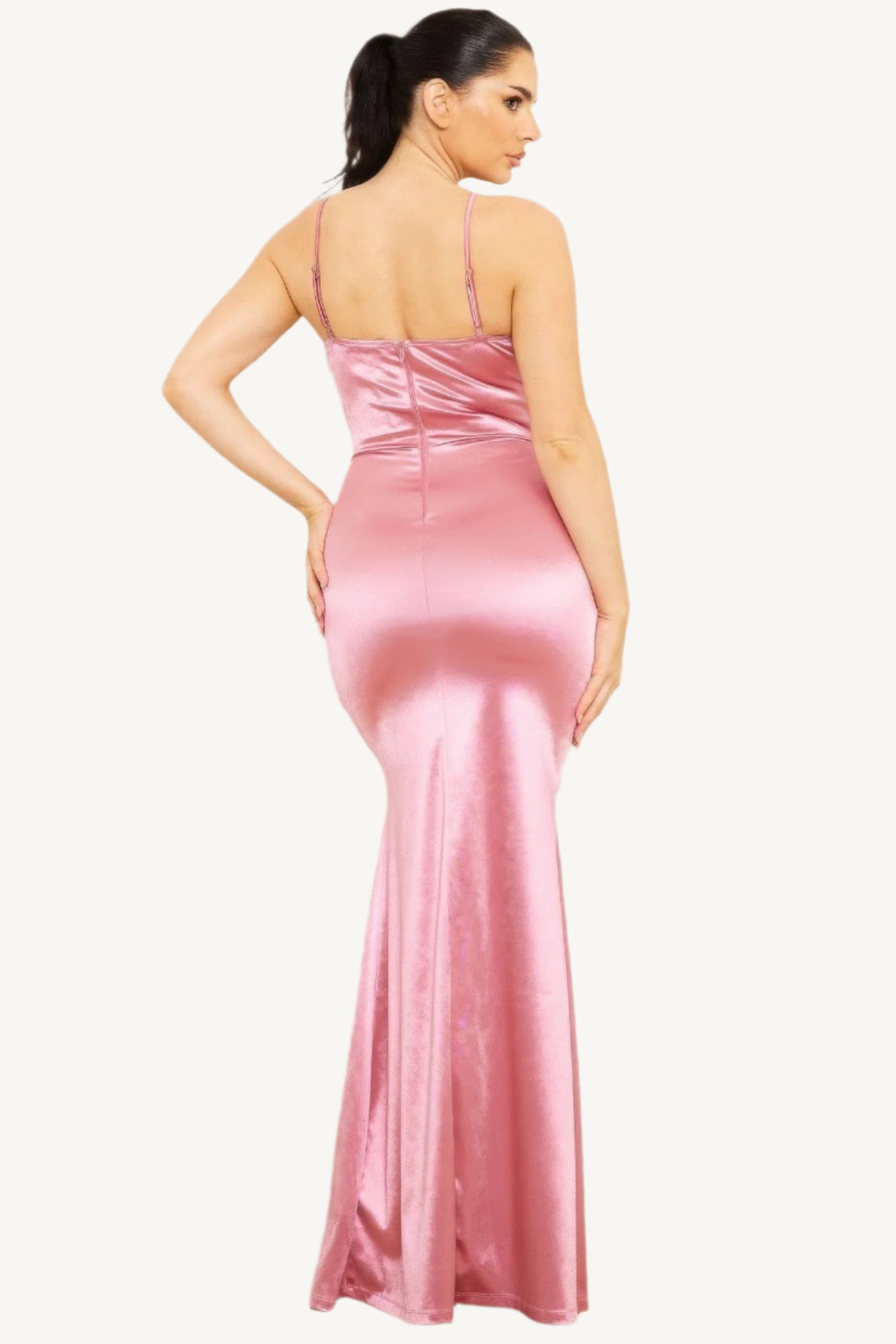 Satin maxi dress with a caged waist detail, crafted for a sleek and elegant silhouette. A graceful and sophisticated ensemble perfect for formal occasions.