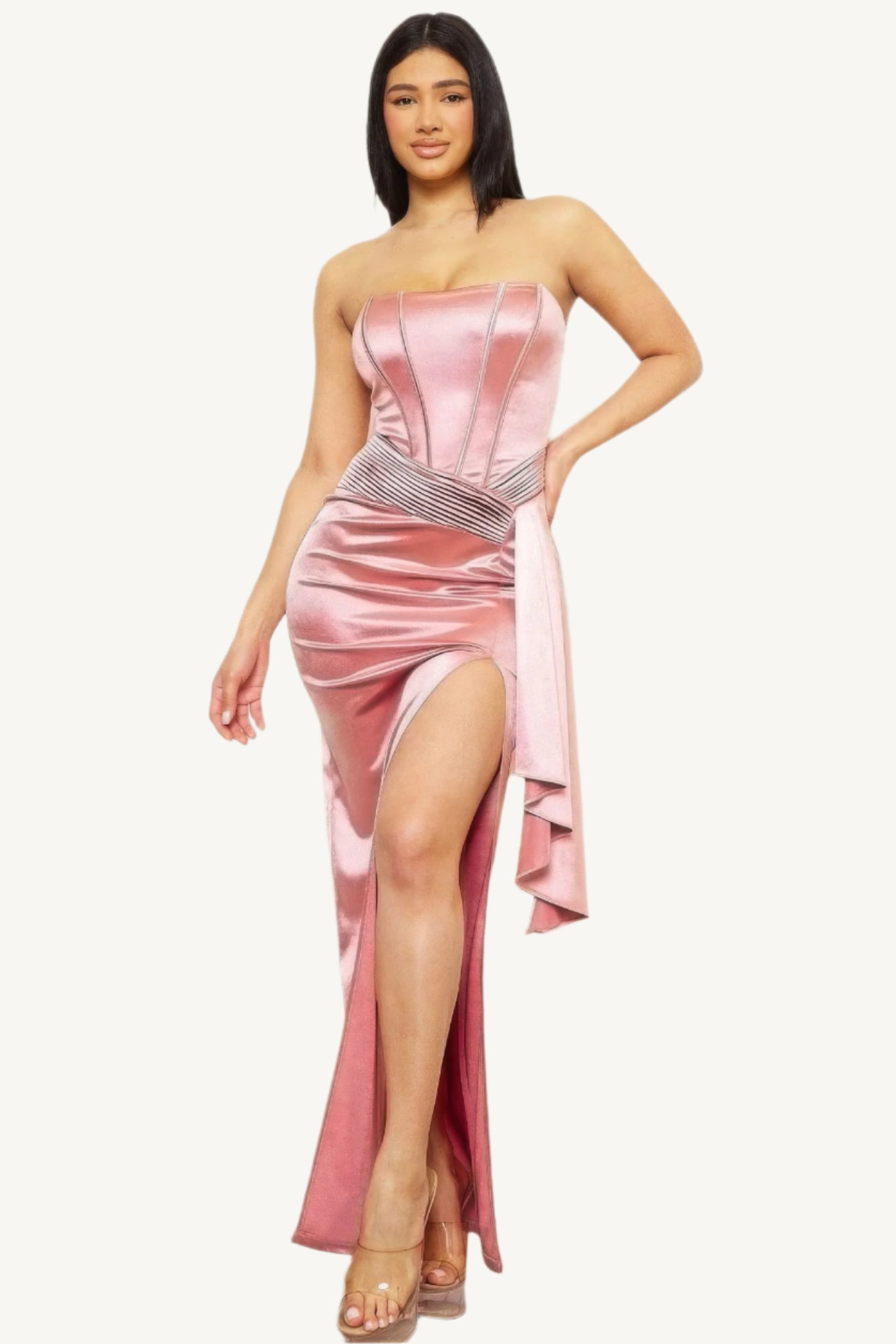 Satin tube top maxi dress with pleated fold design. A strapless, elegant silhouette crafted with meticulous detail for timeless sophistication and charm.