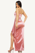 Satin tube top maxi dress with pleated fold design. A strapless, elegant silhouette crafted with meticulous detail for timeless sophistication and charm.
