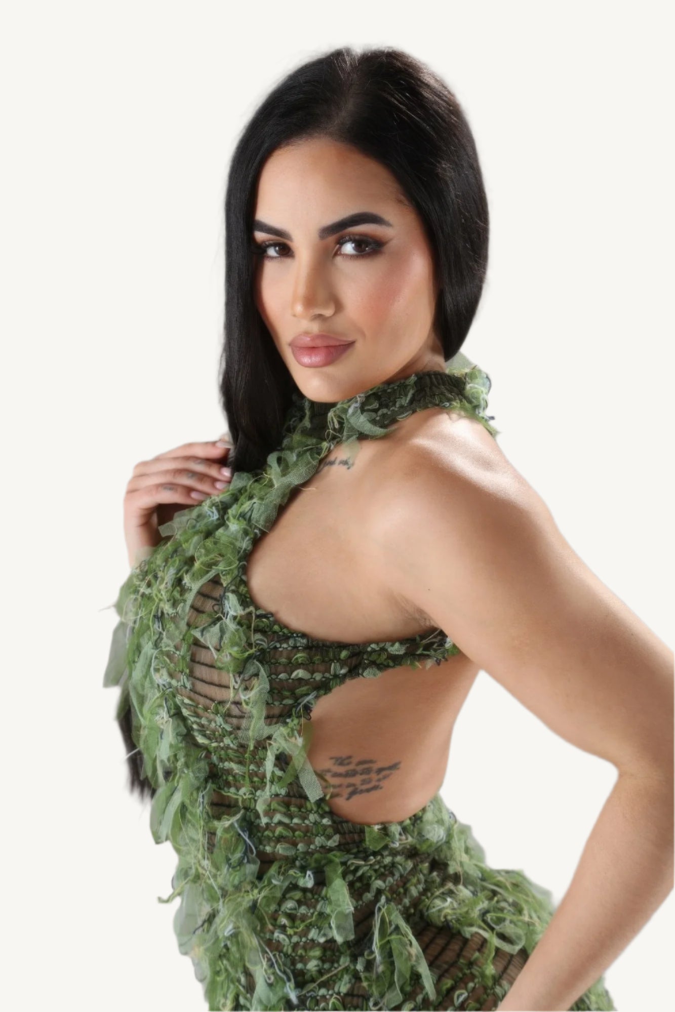 Halter ruffled dress with elegant neckline and layered ruffle details. A stylish and comfortable piece designed to blend modern flair with timeless elegance.