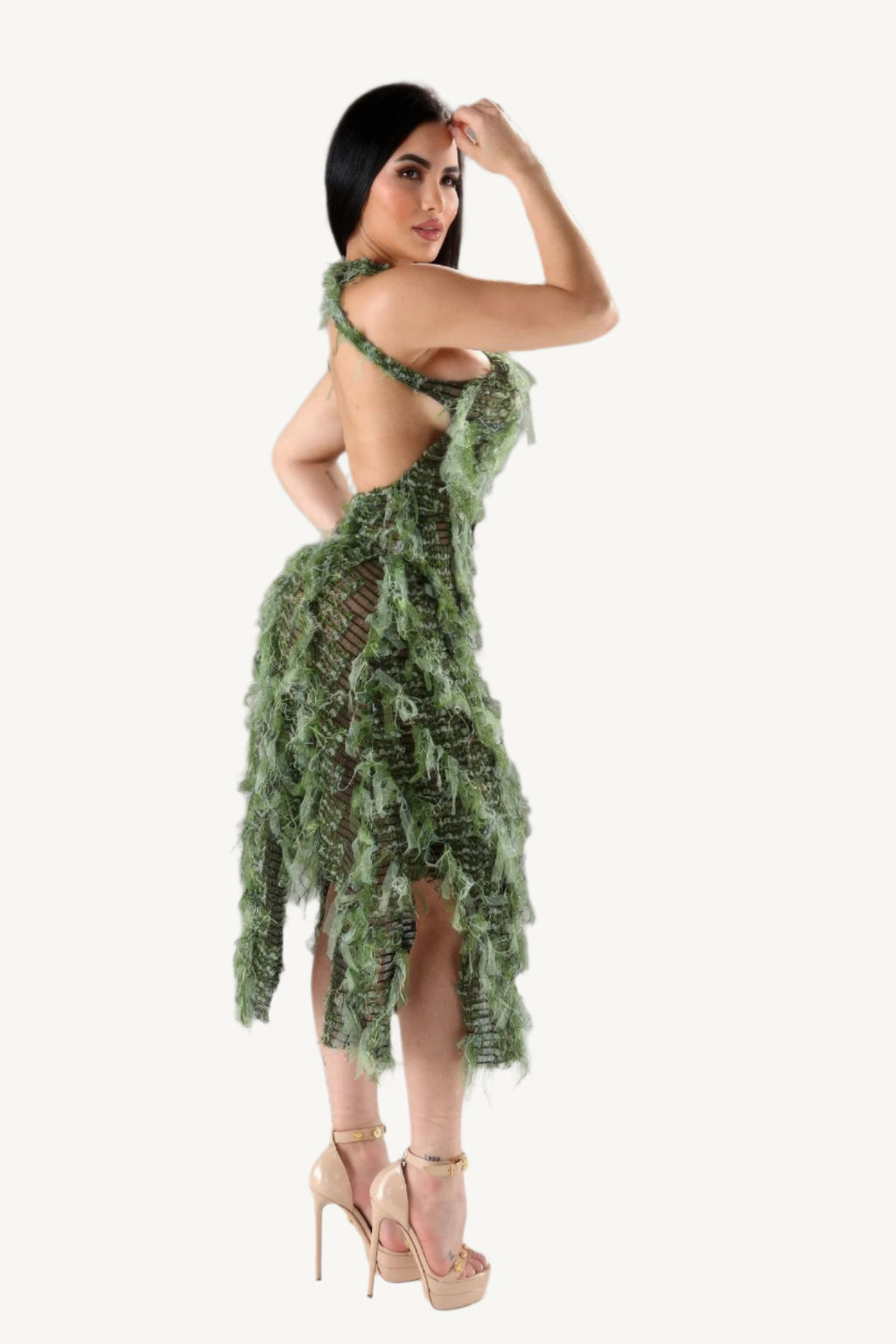 Halter ruffled dress with elegant neckline and layered ruffle details. A stylish and comfortable piece designed to blend modern flair with timeless elegance.