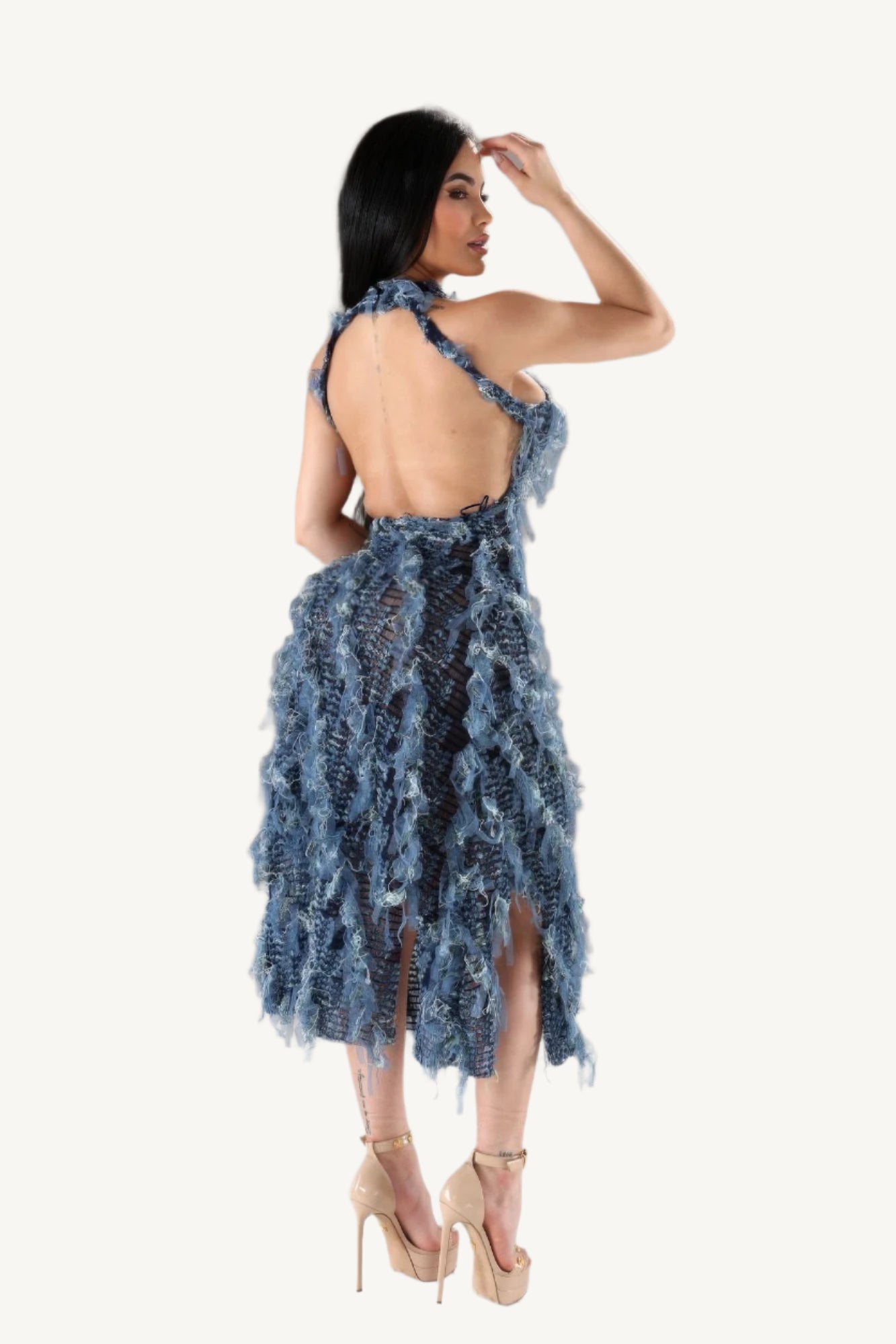 Elegant halter ruffled dress with a modern silhouette, featuring soft layered ruffles and a flattering neckline. Designed for comfort, style, and sophistication.