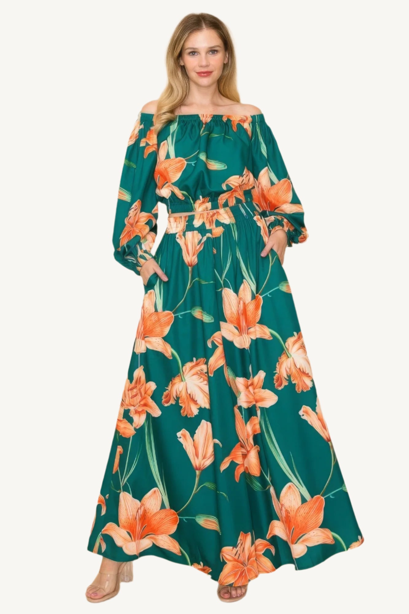 Off-shoulder top and wide-leg pants set with elastic detailing. Made from a luxurious blend of 90% polyester and 10% nylon for a chic, comfortable, and effortless look.