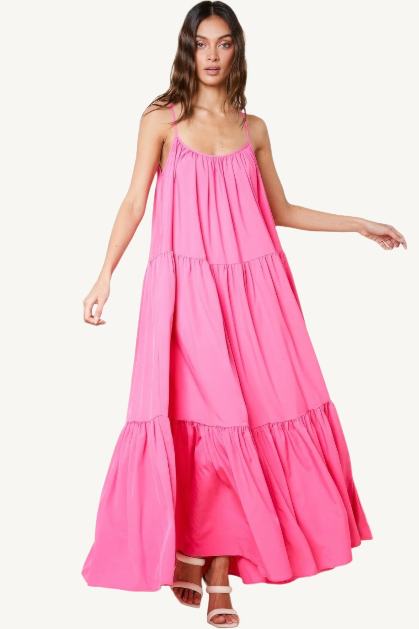 Maxi sun dress with adjustable straps, roomy side pockets, and an extra-wide A-line silhouette. A breezy and stylish choice for warm sunny days.