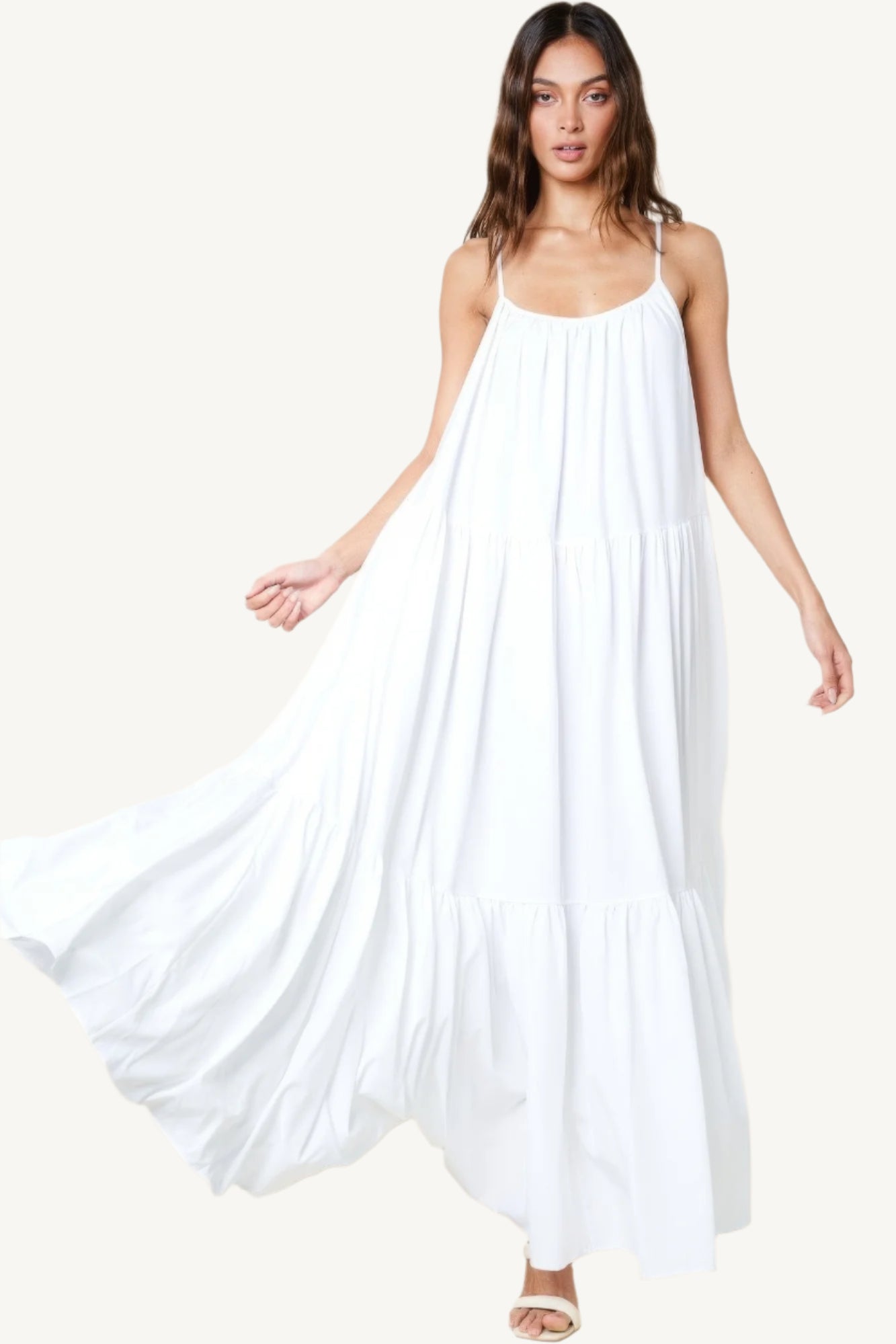 Flowy maxi sun dress with adjustable straps, extra-wide A-line silhouette, and side pockets. Designed for comfort, elegance, and warm-weather ease.