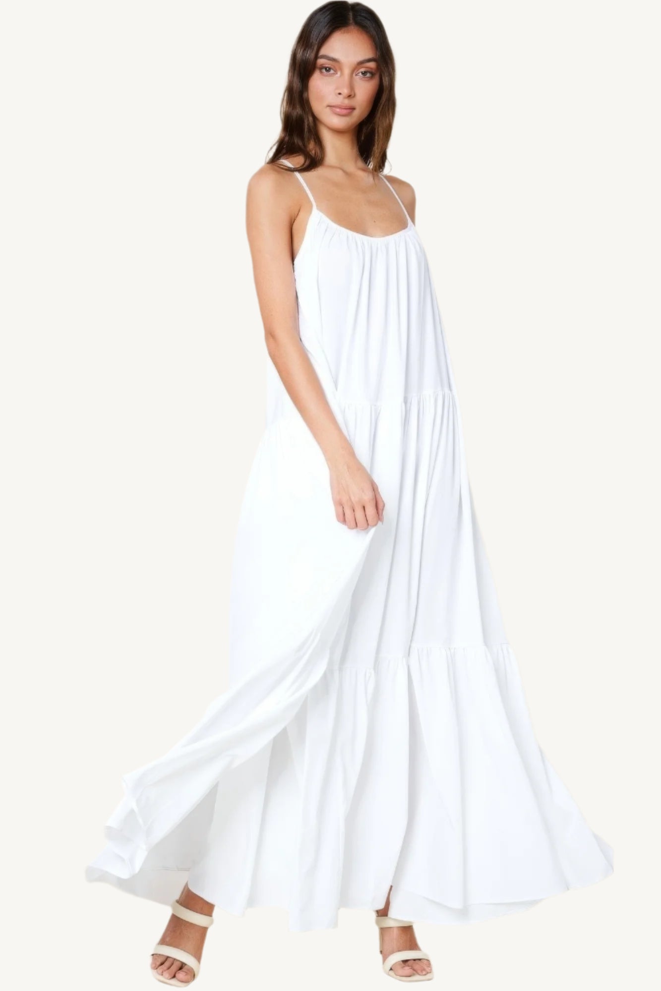 Flowy maxi sun dress with adjustable straps, extra-wide A-line silhouette, and side pockets. Designed for comfort, elegance, and warm-weather ease.
