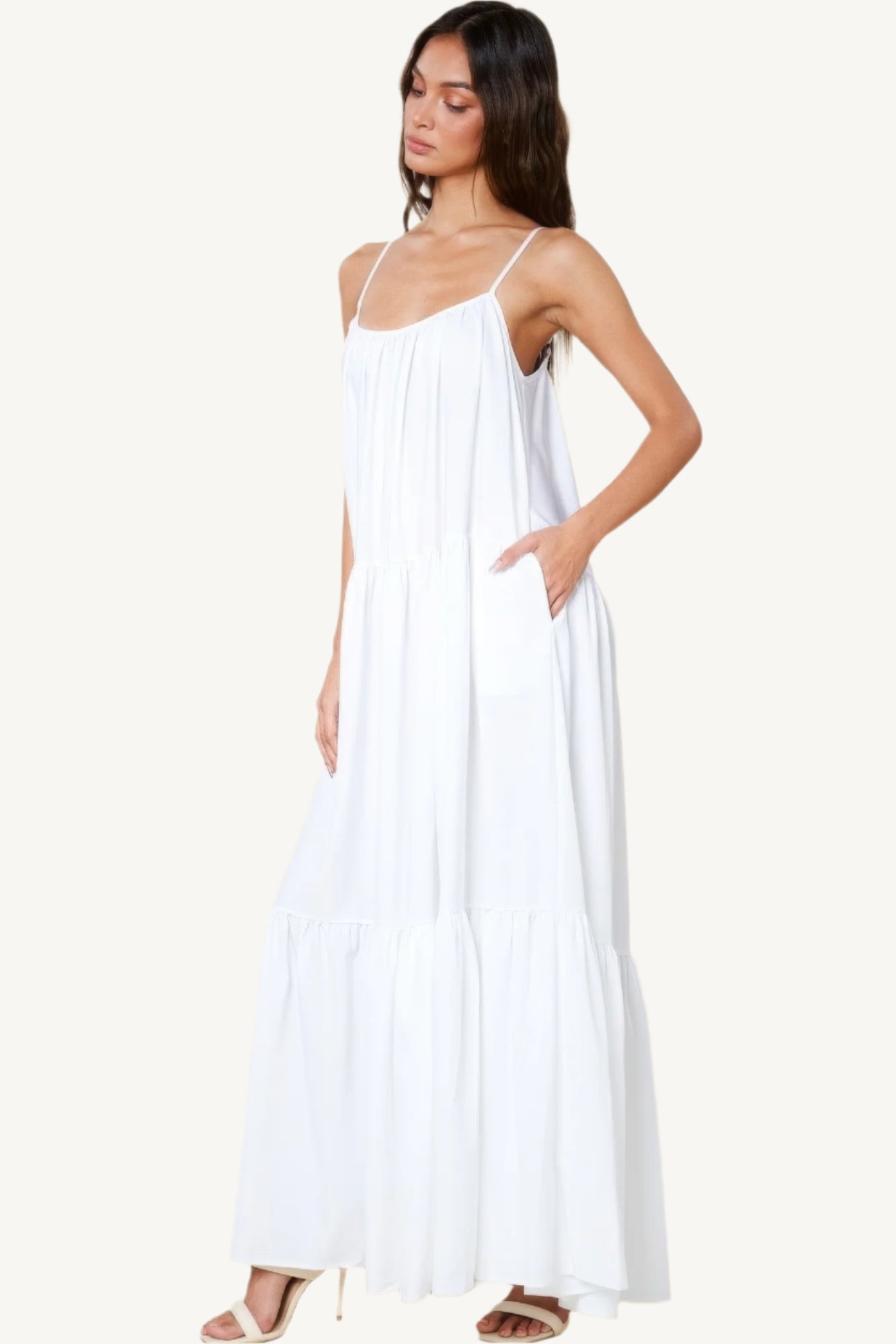 Flowy maxi sun dress with adjustable straps, extra-wide A-line silhouette, and side pockets. Designed for comfort, elegance, and warm-weather ease.