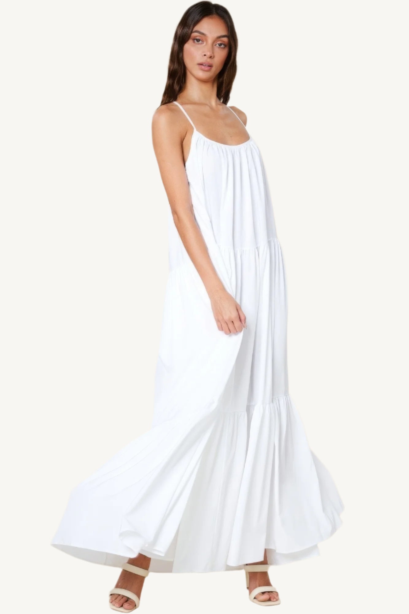 Flowy maxi sun dress with adjustable straps, extra-wide A-line silhouette, and side pockets. Designed for comfort, elegance, and warm-weather ease.