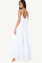 Flowy maxi sun dress with adjustable straps, extra-wide A-line silhouette, and side pockets. Designed for comfort, elegance, and warm-weather ease.