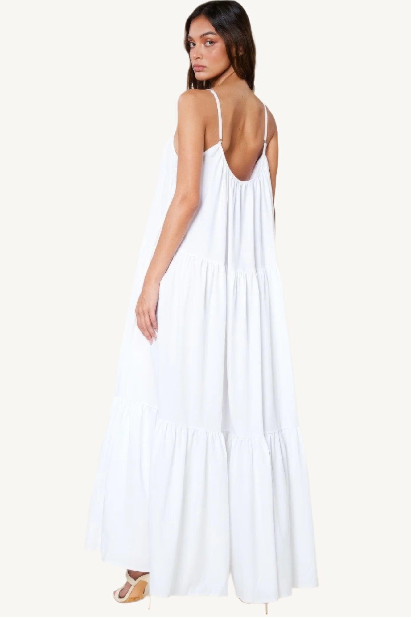 Flowy maxi sun dress with adjustable straps, extra-wide A-line silhouette, and side pockets. Designed for comfort, elegance, and warm-weather ease.