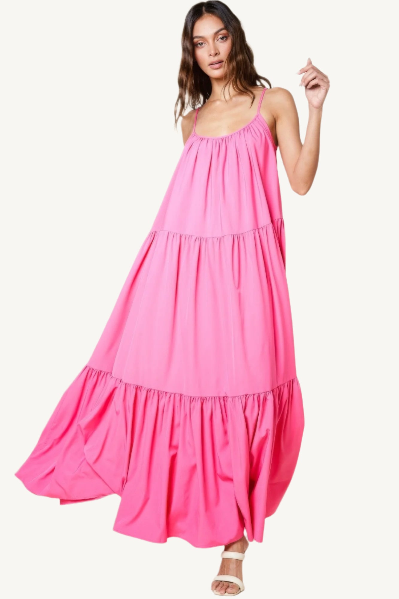 Maxi sun dress with adjustable straps, roomy side pockets, and an extra-wide A-line silhouette. A breezy and stylish choice for warm sunny days.