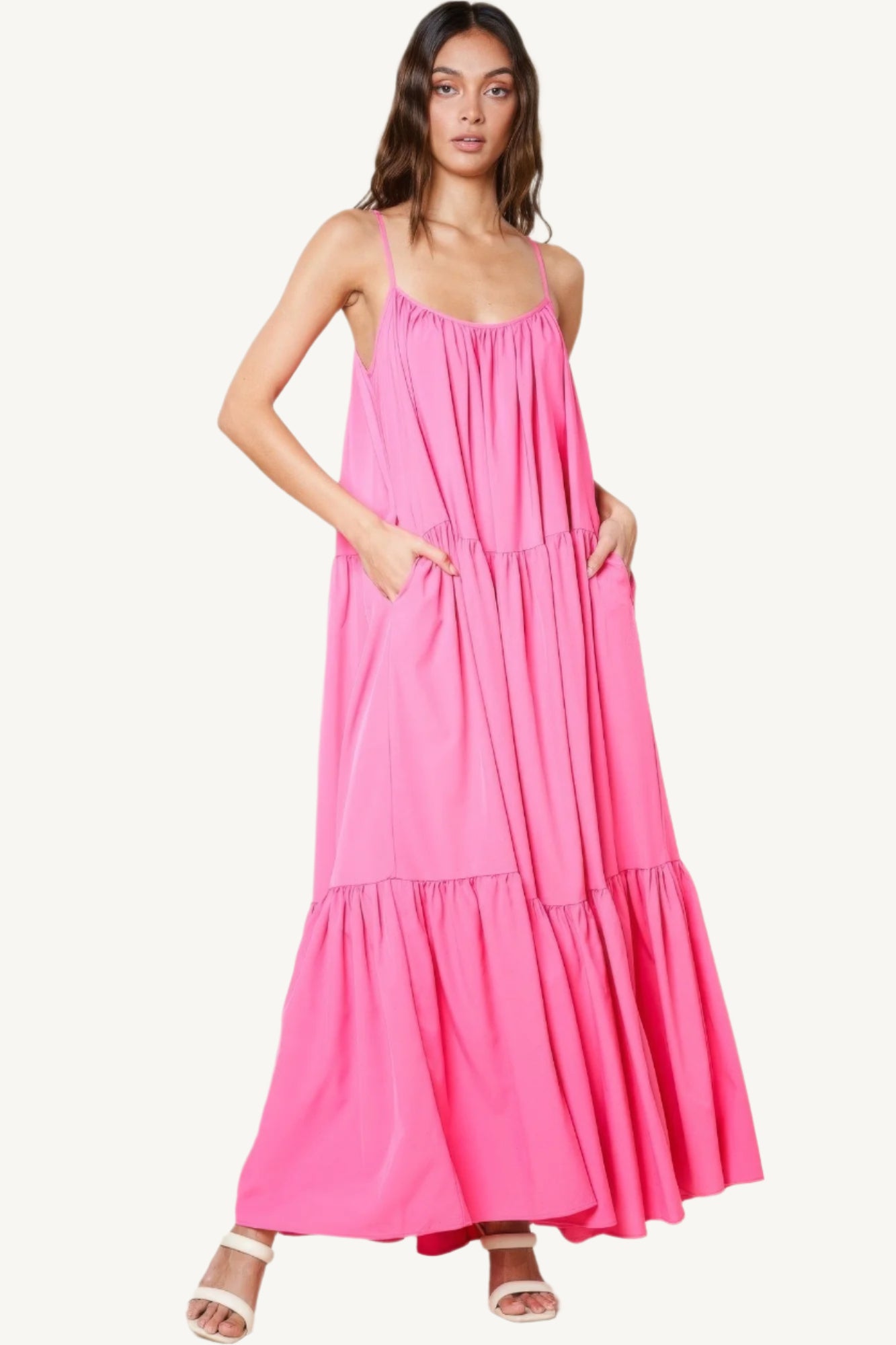 Maxi sun dress with adjustable straps, roomy side pockets, and an extra-wide A-line silhouette. A breezy and stylish choice for warm sunny days.