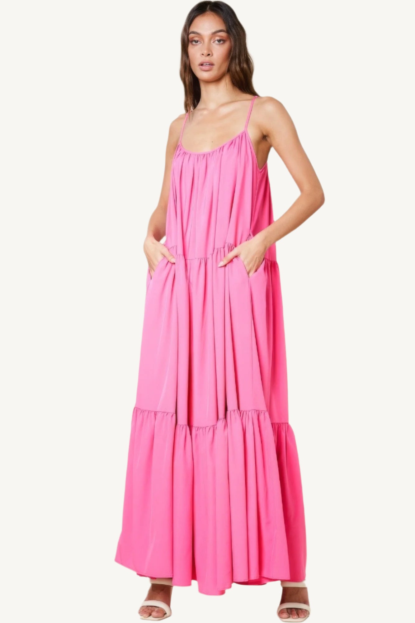 Maxi sun dress with adjustable straps, roomy side pockets, and an extra-wide A-line silhouette. A breezy and stylish choice for warm sunny days.