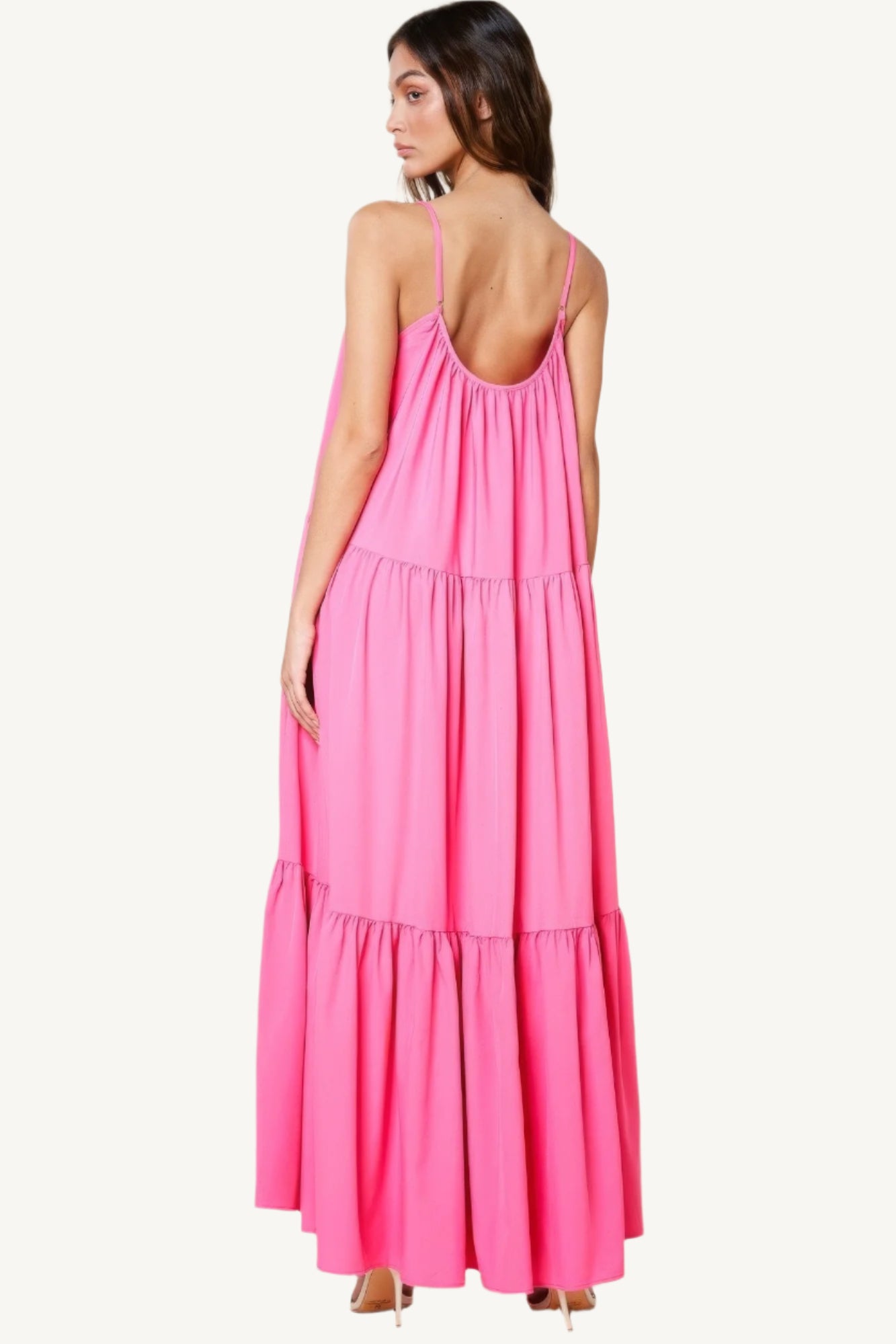 Maxi sun dress with adjustable straps, roomy side pockets, and an extra-wide A-line silhouette. A breezy and stylish choice for warm sunny days.