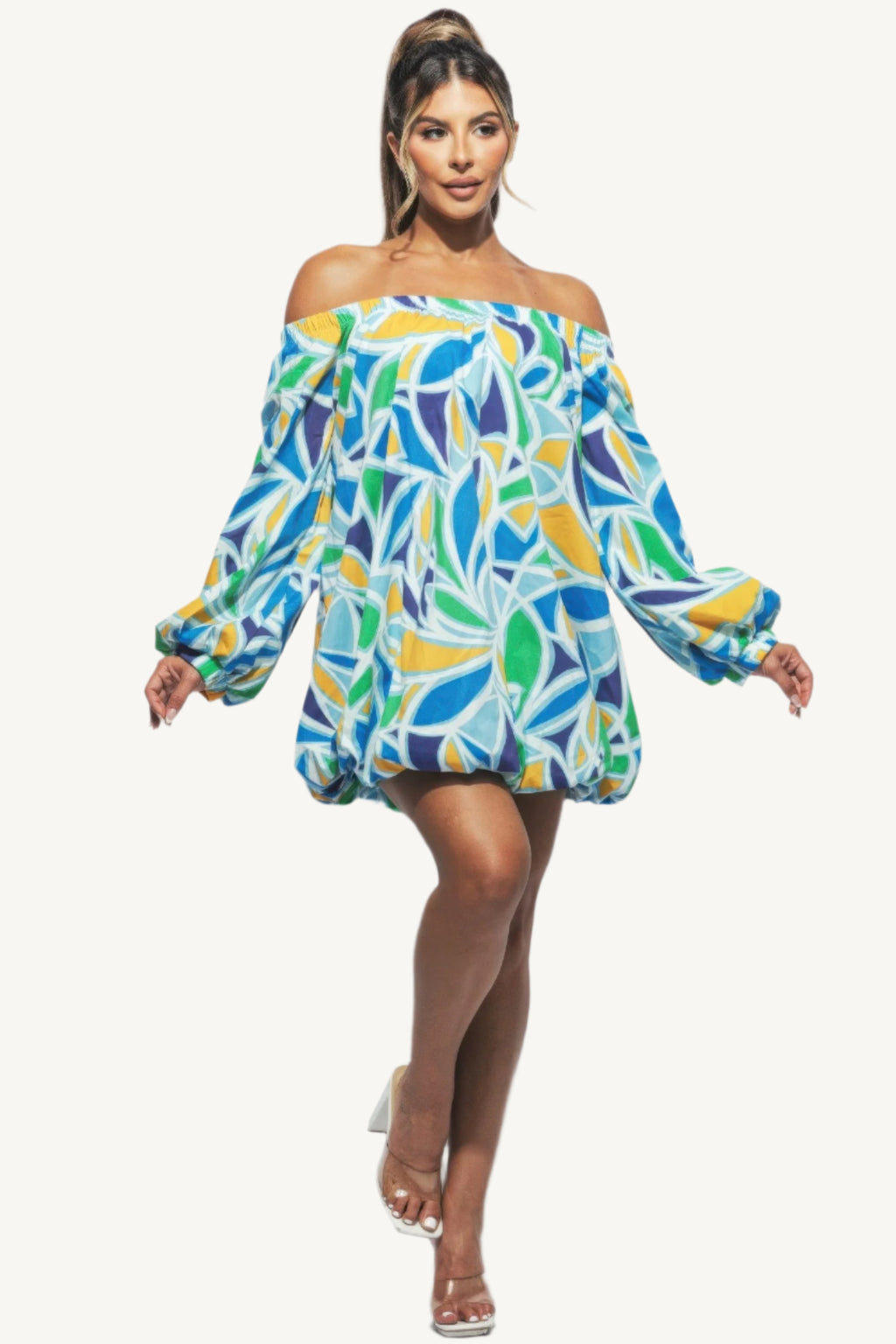 Chic off shoulder bubble mini dress crafted from high-quality fabric. A modern, playful yet elegant piece designed to turn heads at any event.